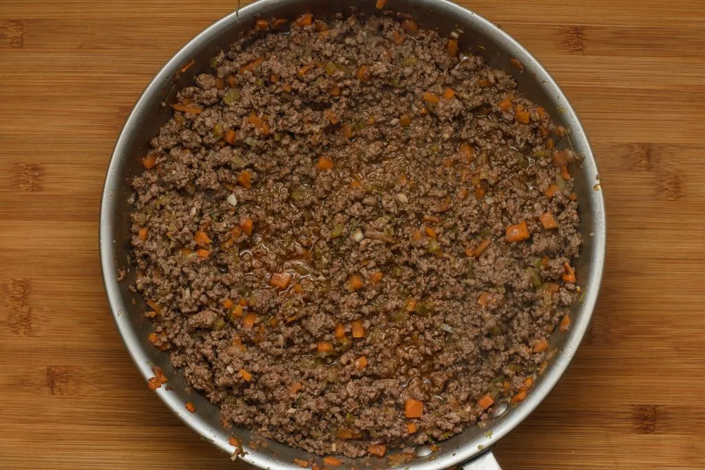 Mirepoix-onion-carrot-celery-ground-meat-brown-tomato-wine-skillet--gp--5-SunCakeMom