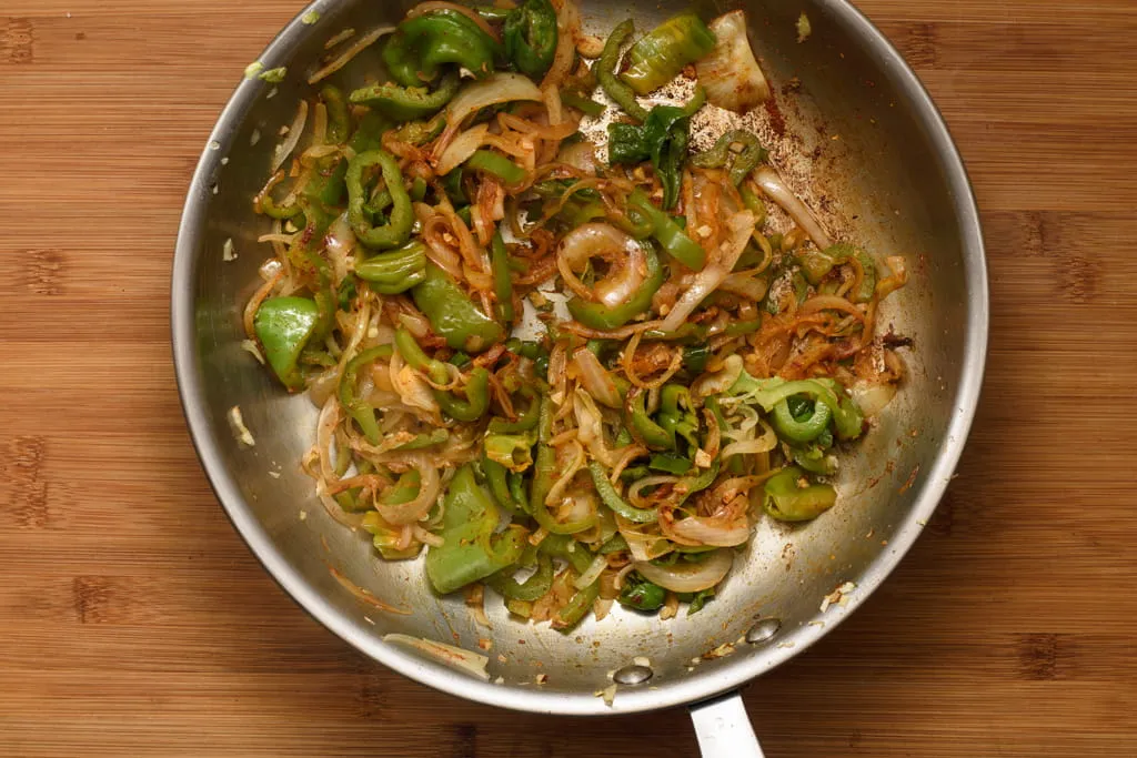 Onion-sliced-glassy-translucent-green-pepper-garlic-spices-herbs-paprika-skillet--gp--2-SunCakeMom