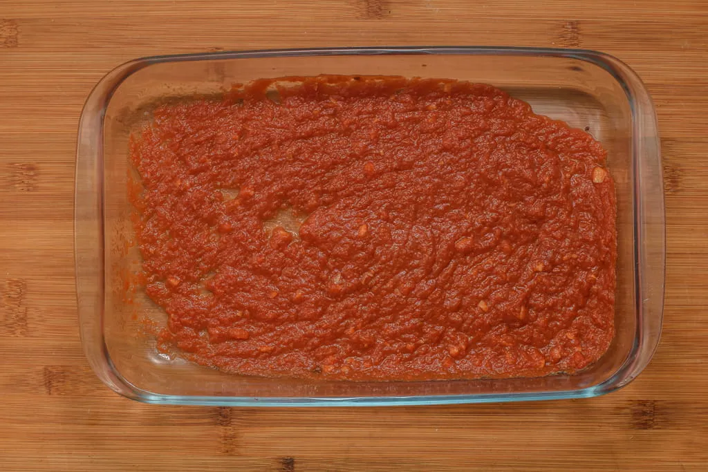 Tomato-sauce-spread-ladle-casserole-dish--gp--1-SunCakeMom